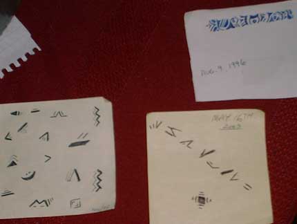 strange symbols on scraps of paper